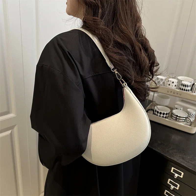The Petite Half-Moon Bag, product photograph for the SIX7 handbag collection