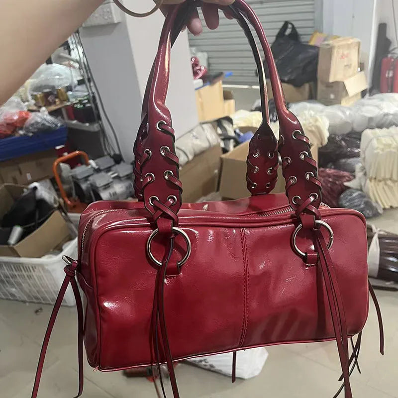 The Eyelet Boston Bag